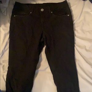 Pair of black cuffed Capri jeans